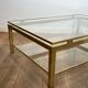 Modernist coffee table in brass and glass tops by Guy Lefèvre for Maison Jansen.