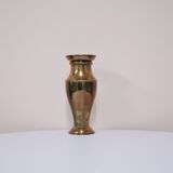 Brass vase with cabin inside