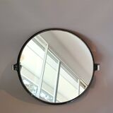 Vintage 1980s smoked brown PVC swivel mirror.