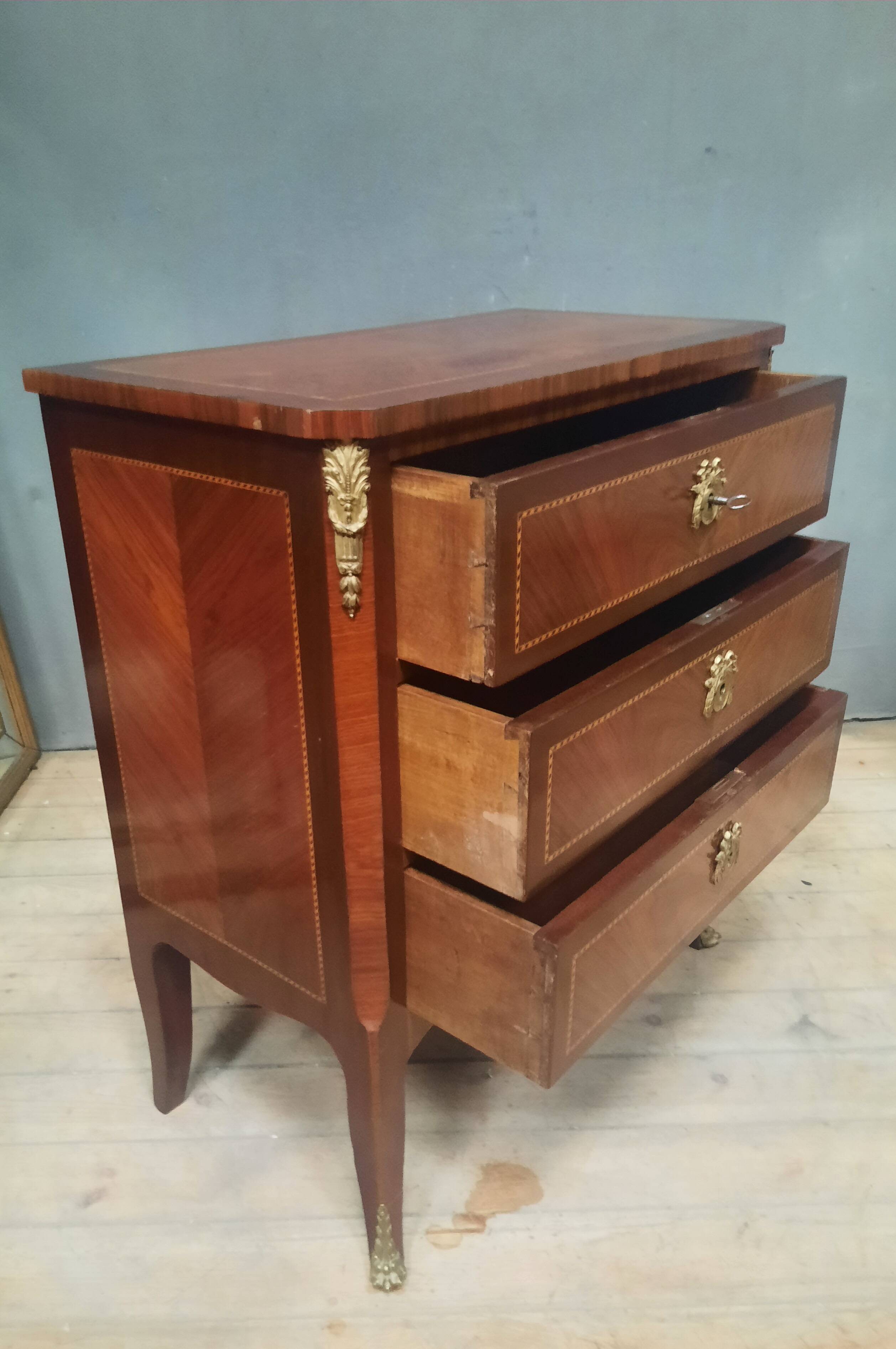 Small transitional style inlaid chest of drawers