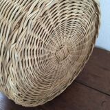 Round basket Wicker braided with two handles.