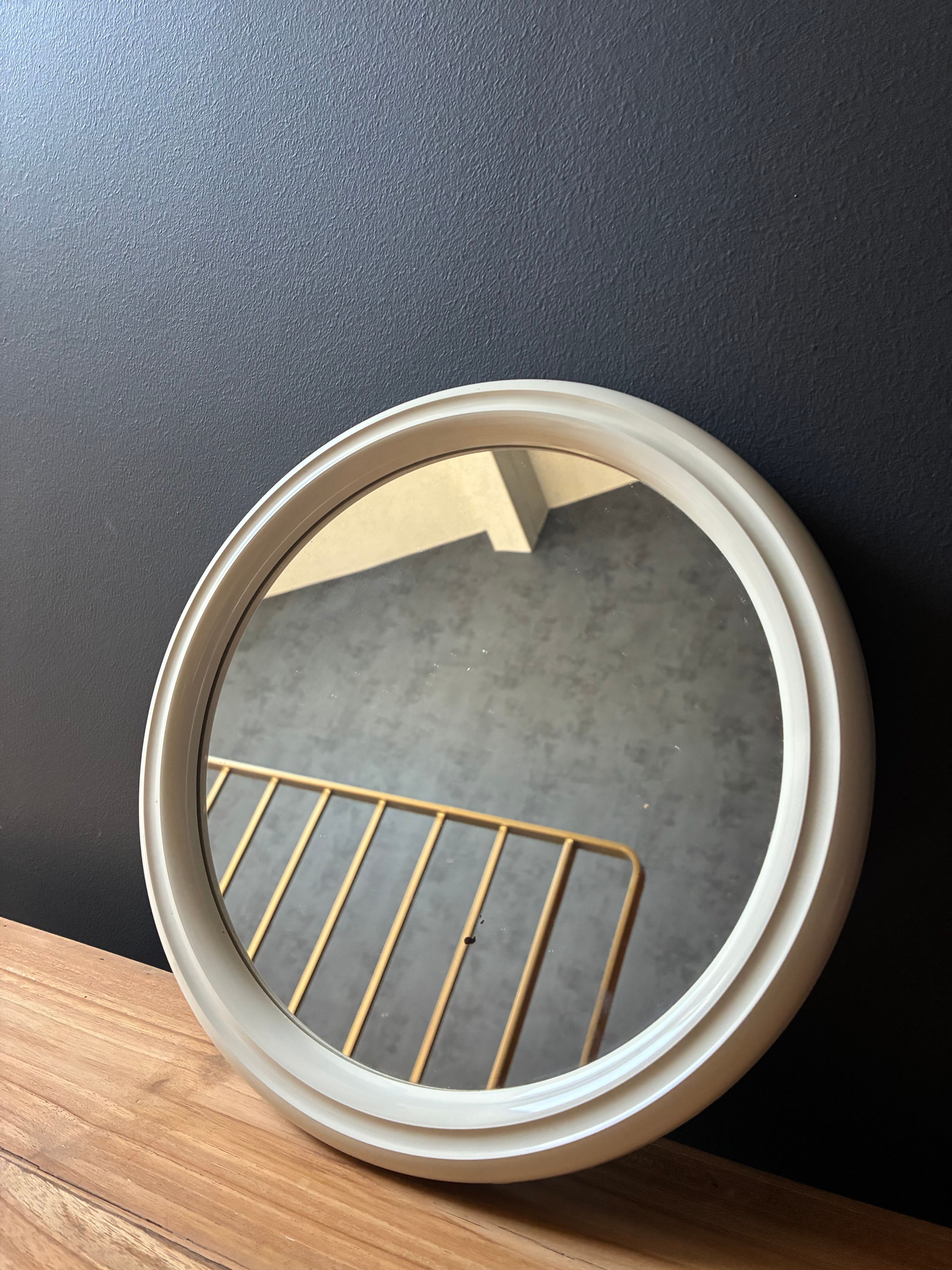 Vintage Space Age by Tiger small round mirror in moulded plastic.