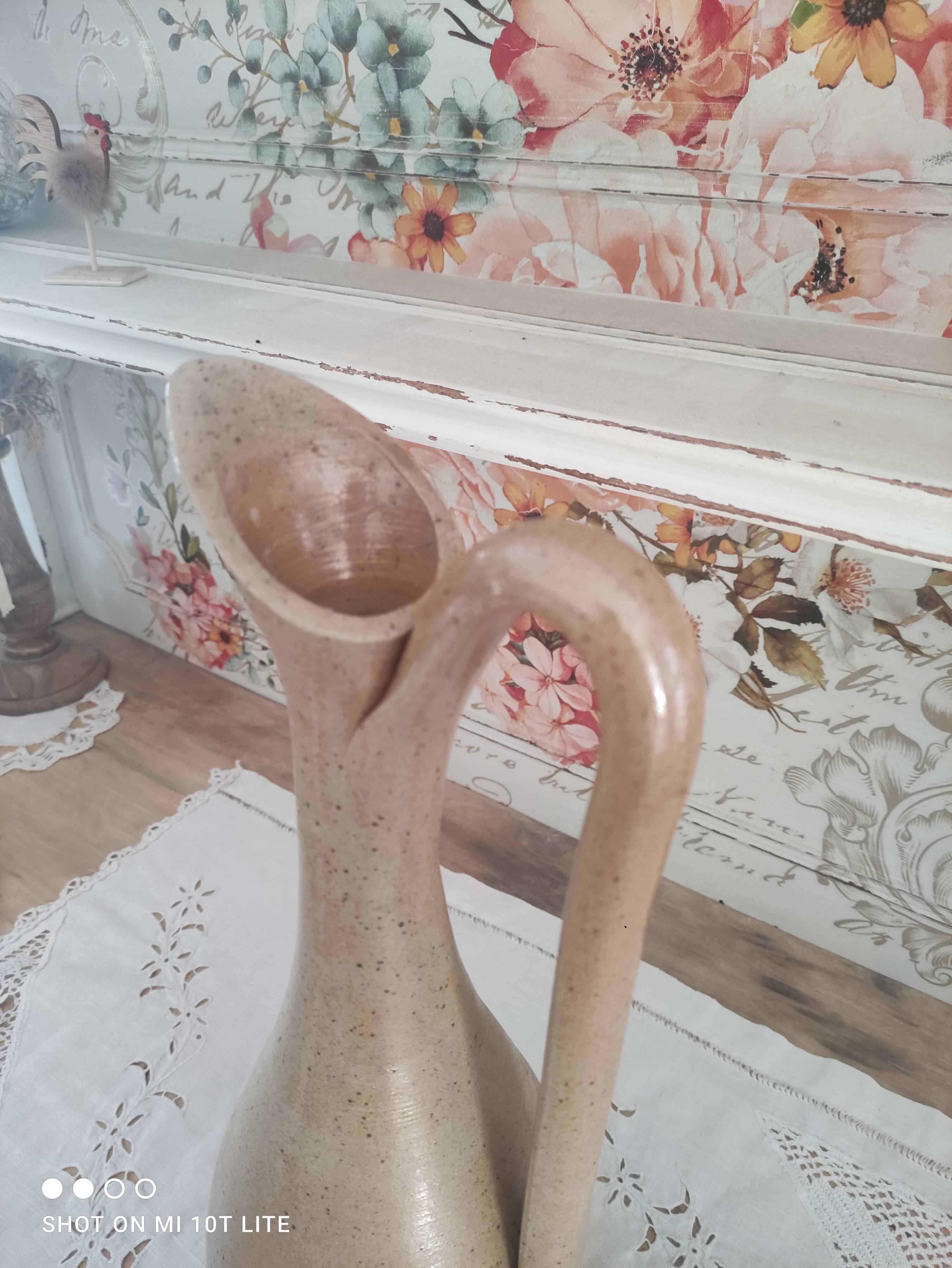 Vintage pitcher in light brown sandstone speckled