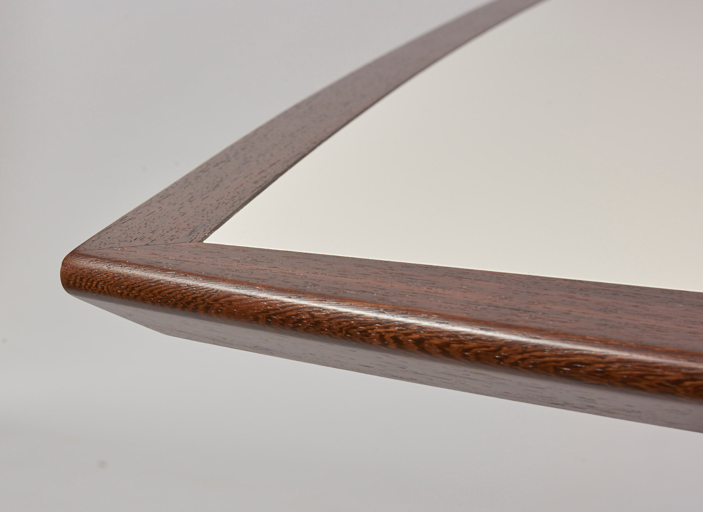 Brutalist conference table made of wood and steel