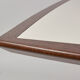 Brutalist conference table made of wood and steel