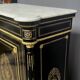 Napoleon III style commode, decorated with brass marquetry and gilded bronze mounts.