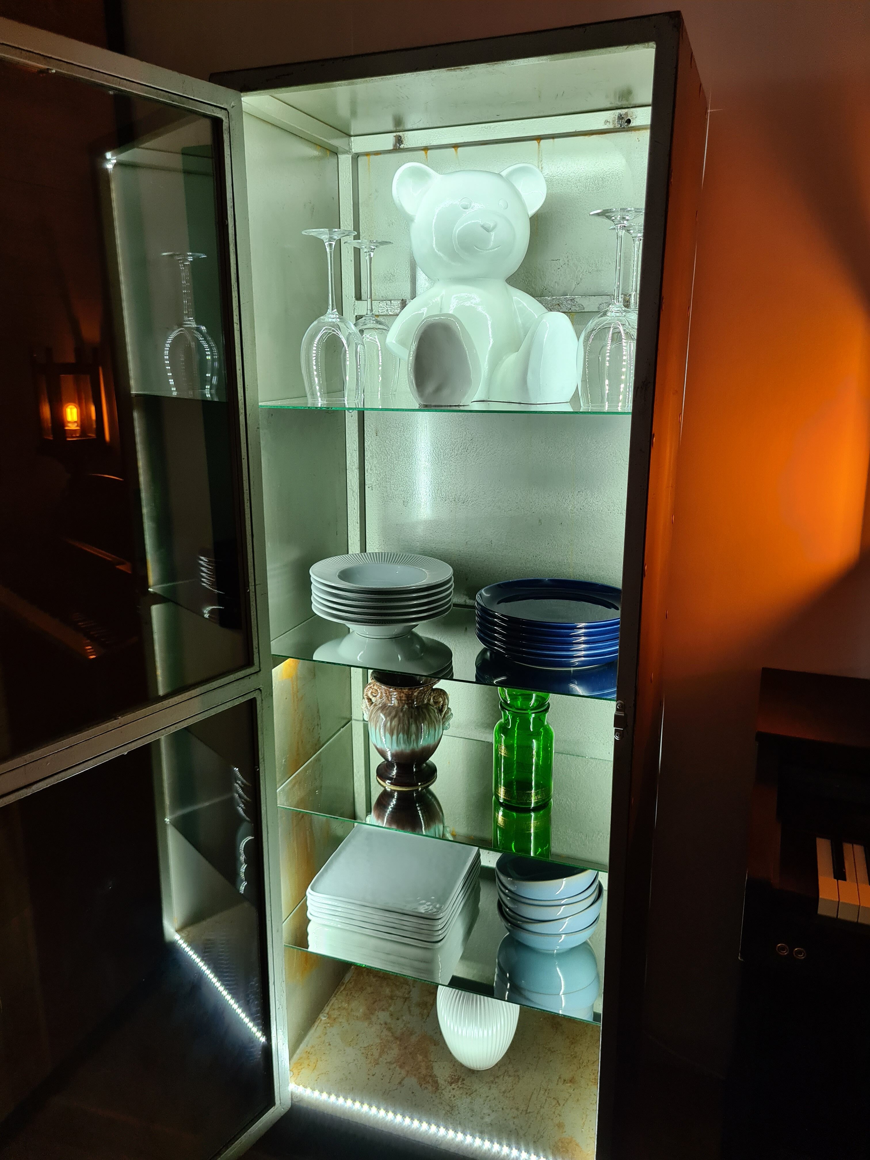 Vintage industrial showcase with LED interior lighting