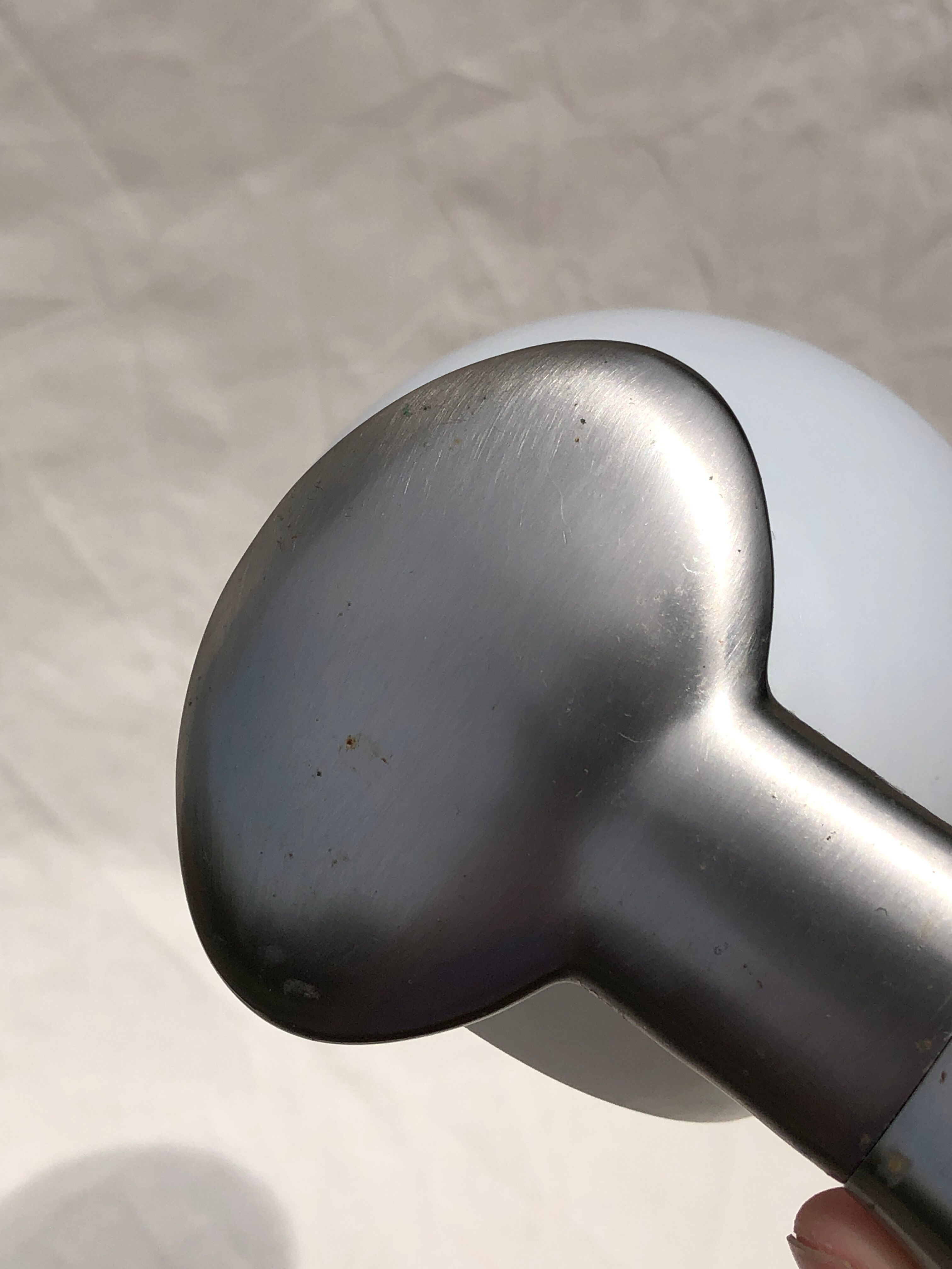 Pair of brushed steel appliques, half-egg opaline, 1970