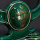 Paire de lampes en faïence verte et dorée, circa 1940