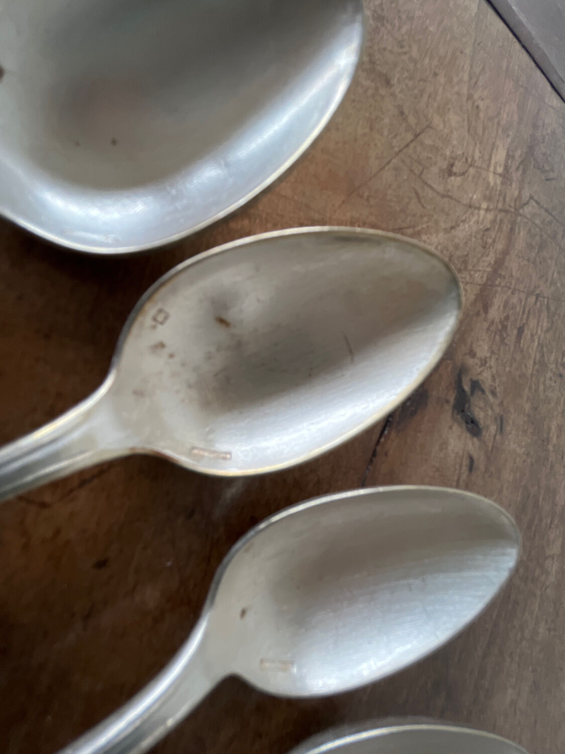 4 teaspoons in silver metal