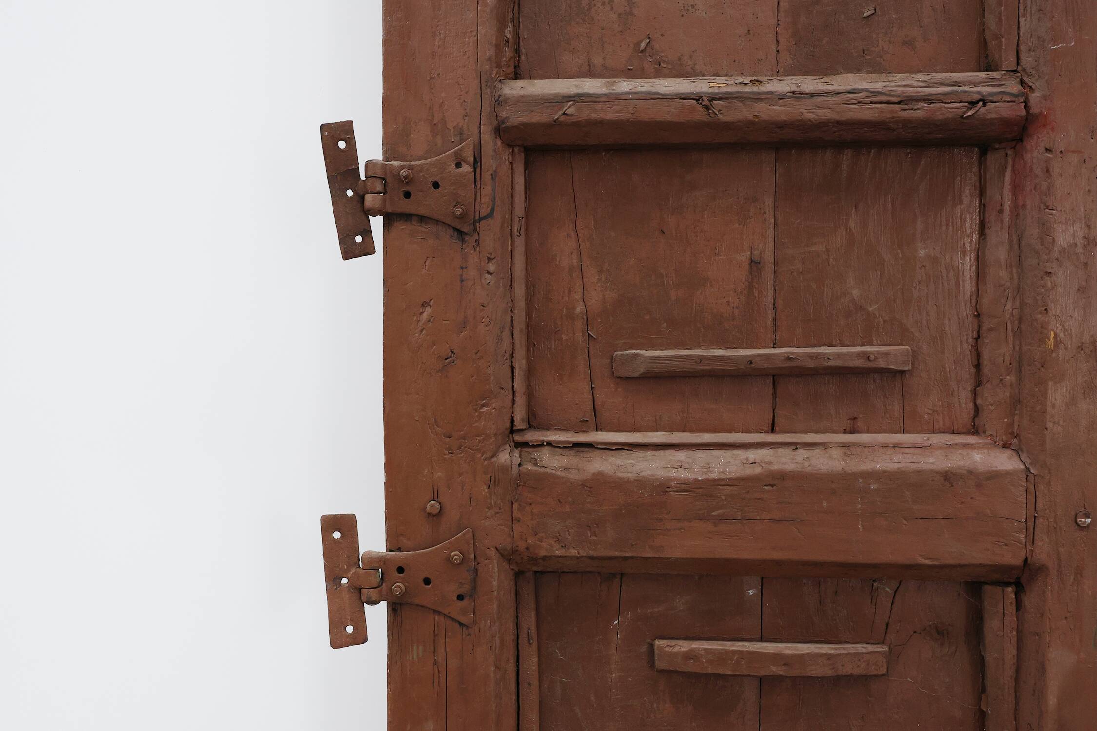 Large 17th century Monastery doors in terracotta lacquered oak, Portugal