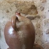 Vernified sandstone oil jar with handle