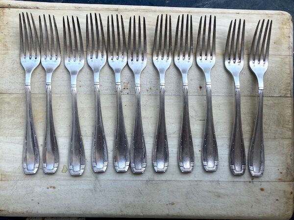 11 silver metal forks