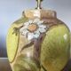 Hubert Olivier ceramic lamp with floral decoration, 1980.