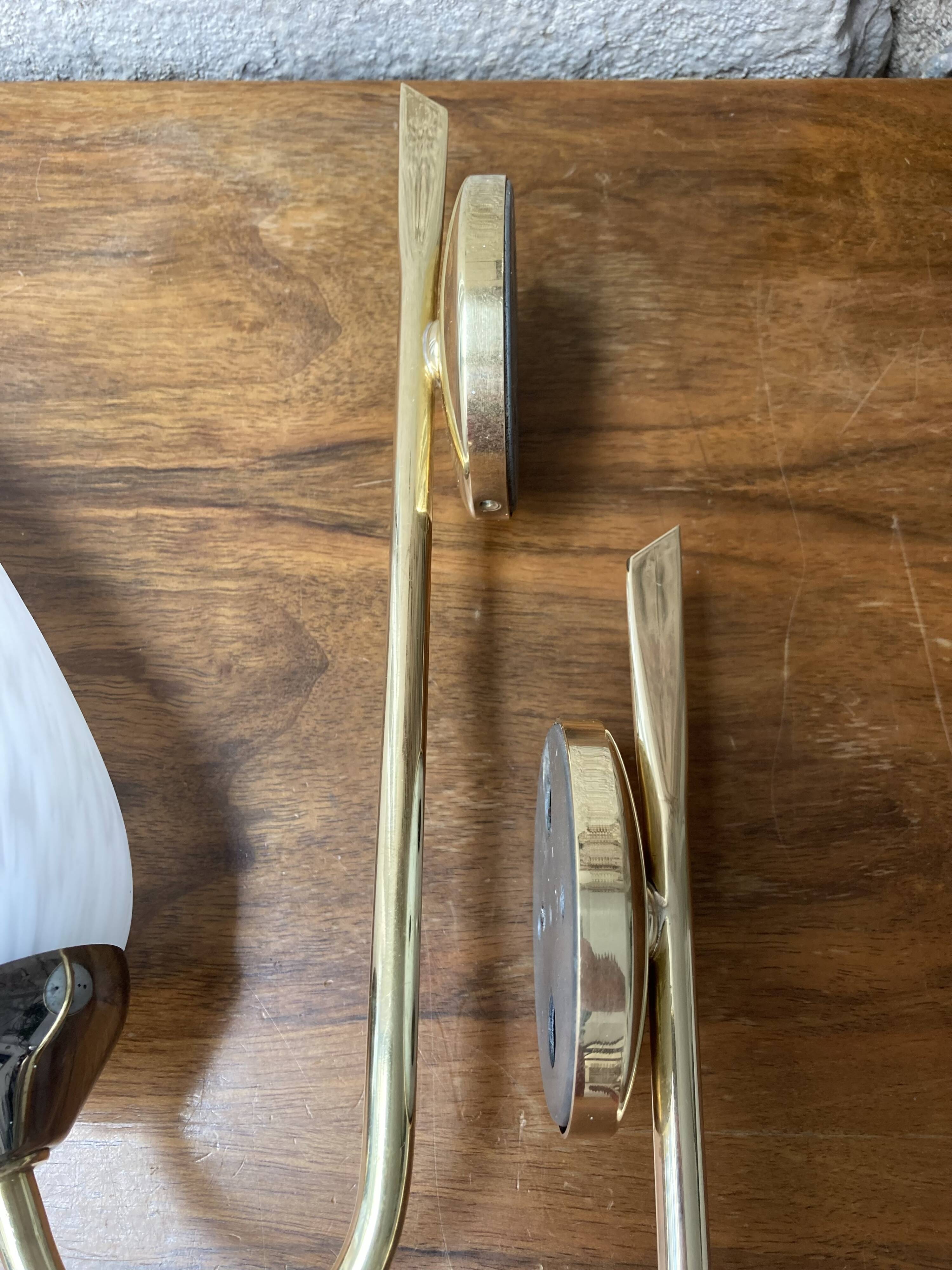 Pair of 50s gold and speckled globe wall lights