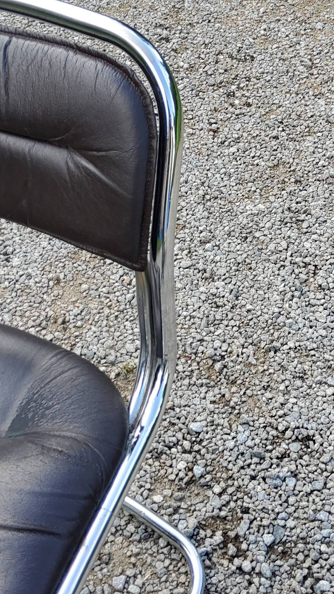 Chair from the 70s in chromed metal and brown moleskine