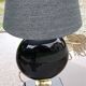 Pair of 70s designer lamps in black ceramic and gold metal