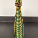 Bottle covered with rattan and scoubidou, 60s-70s