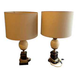 Pair of black marble lamps and ostrich egg
