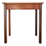 Old wooden table with its drawer