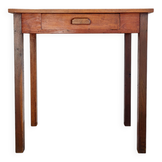 Old wooden table with its drawer