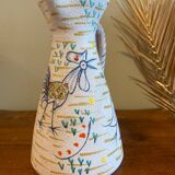 Pitcher with naive bird decor