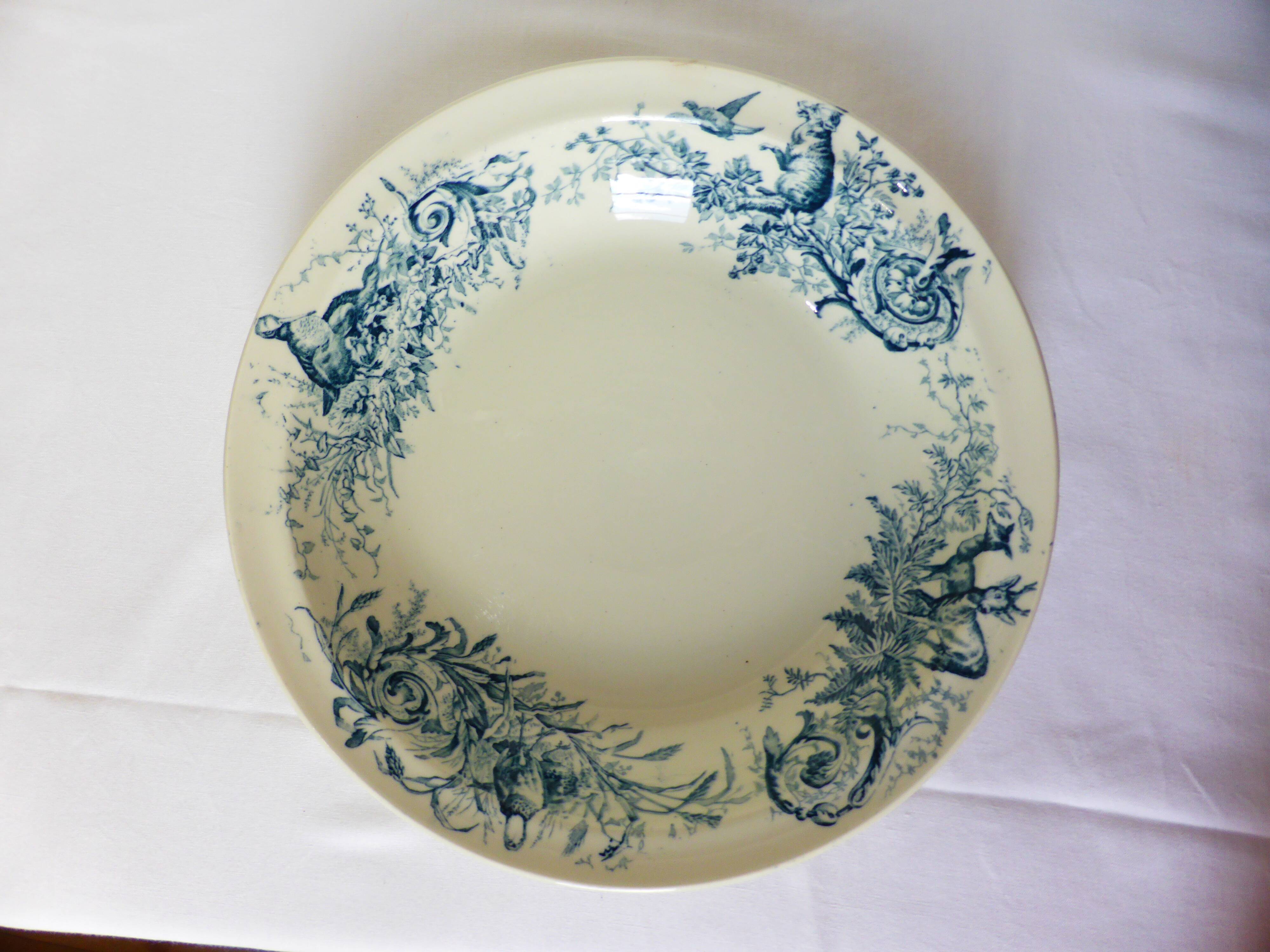 Vintage hollow round serving dish from K&G Luneville hunting