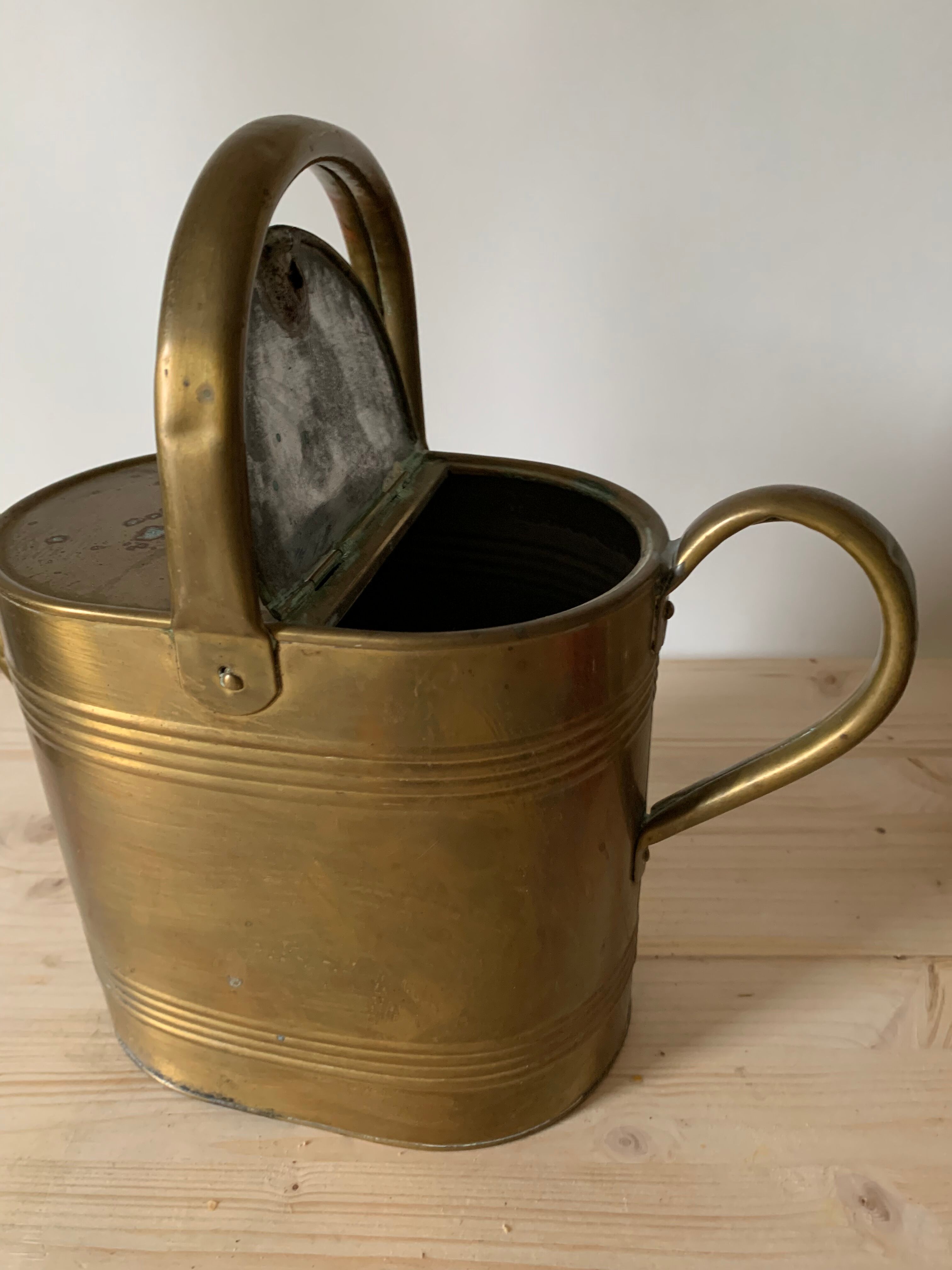 Brass watering can
