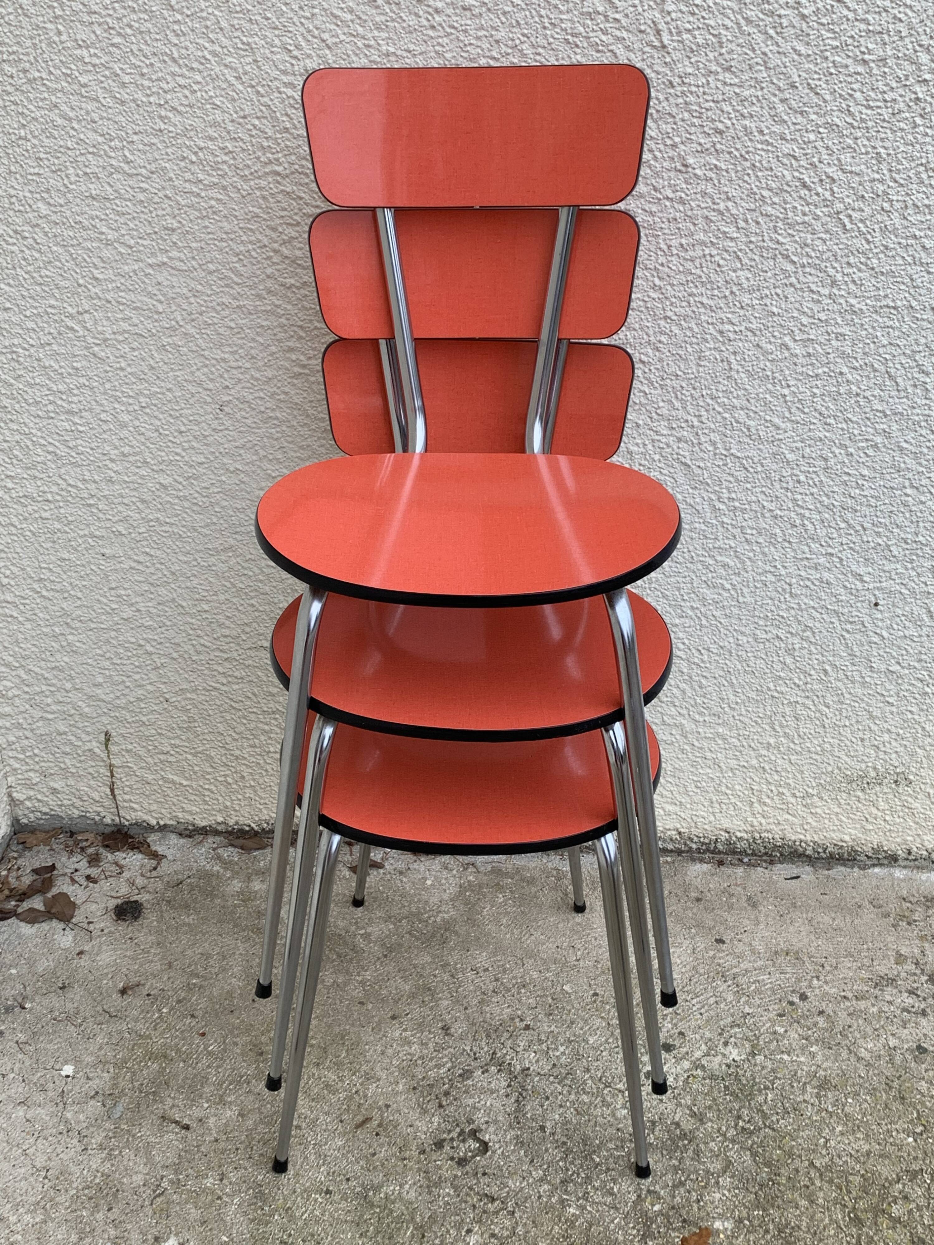 Red formica chairs 1950