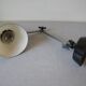 Super Chrome old articulated metal desk lamp on workshop decor base