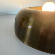 Flush-mounted disc-shaped brass fixture from the mid-century, 1960, Italy.