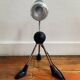 Articulated tripod foot lamp inspired by the Memphis movement