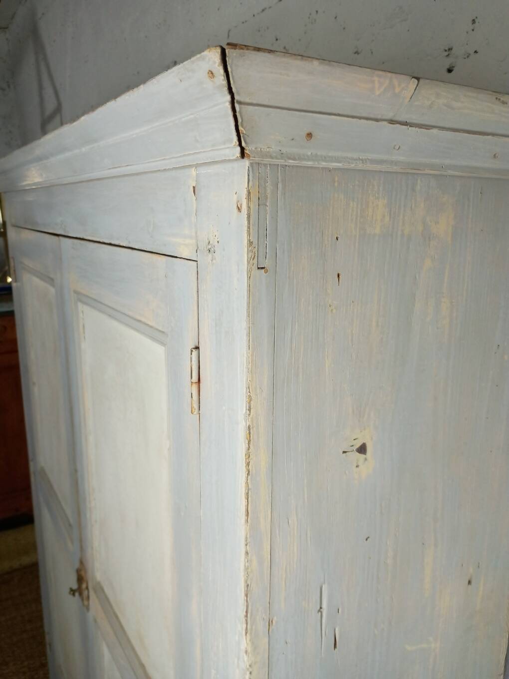 Low Parisian wardrobe with two doors, made of fir with original patina