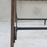 Double bed in burnished brass