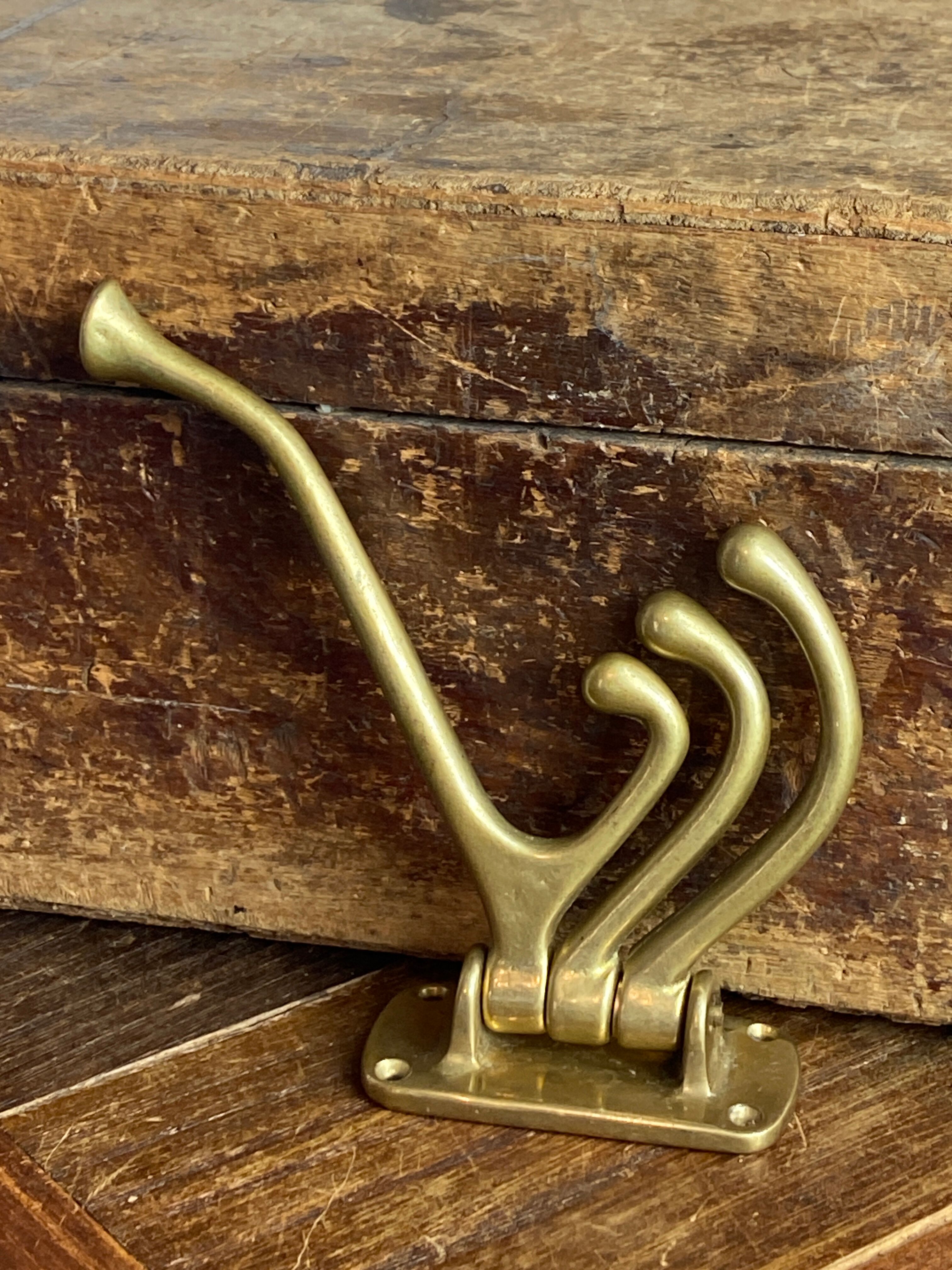 Adjustable nautical coat hook in solid brass