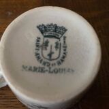 Cup and saucer in Iron Earth St Amand and Hamage Marie Louise