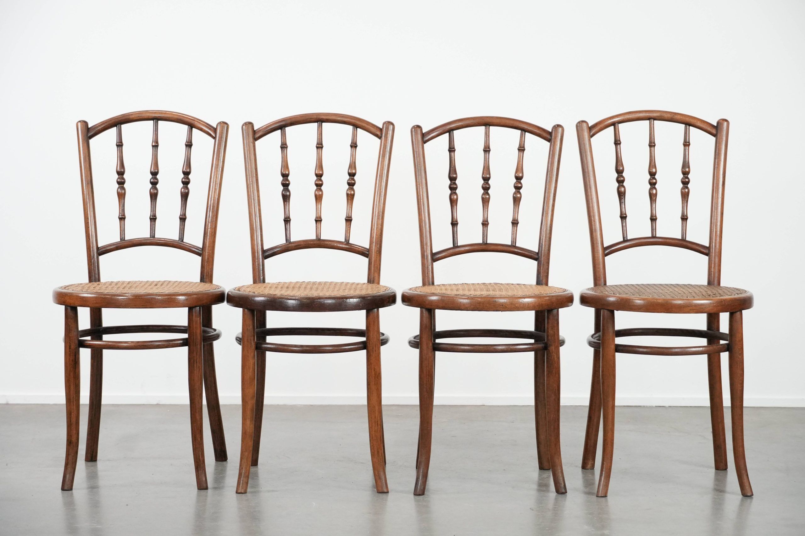 Set of 4 vintage bistro chairs Jacob & Josef Kohn Wien with a wicker seat