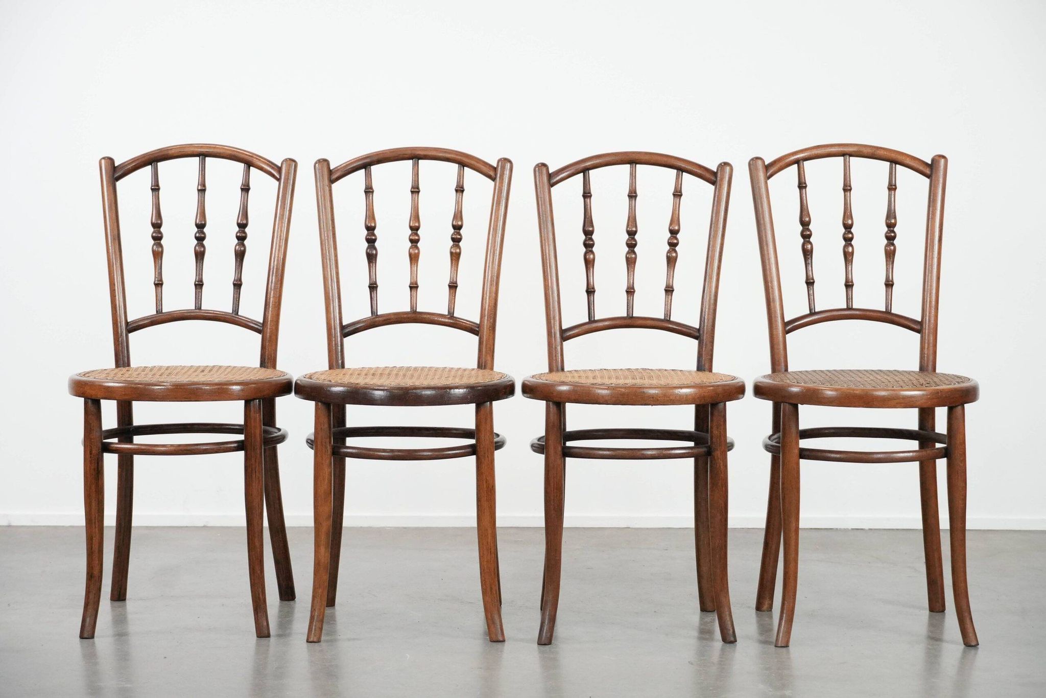 Set of 4 vintage bistro chairs Jacob & Josef Kohn Wien with a wicker seat