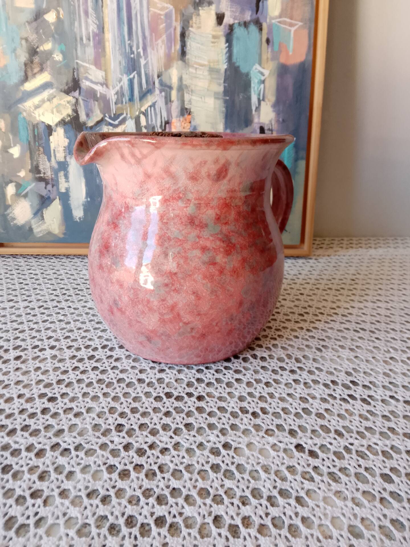 Jug with ice reservoir