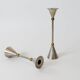 Pair of postmodern candlesticks in Memphis style made of steel and brass.