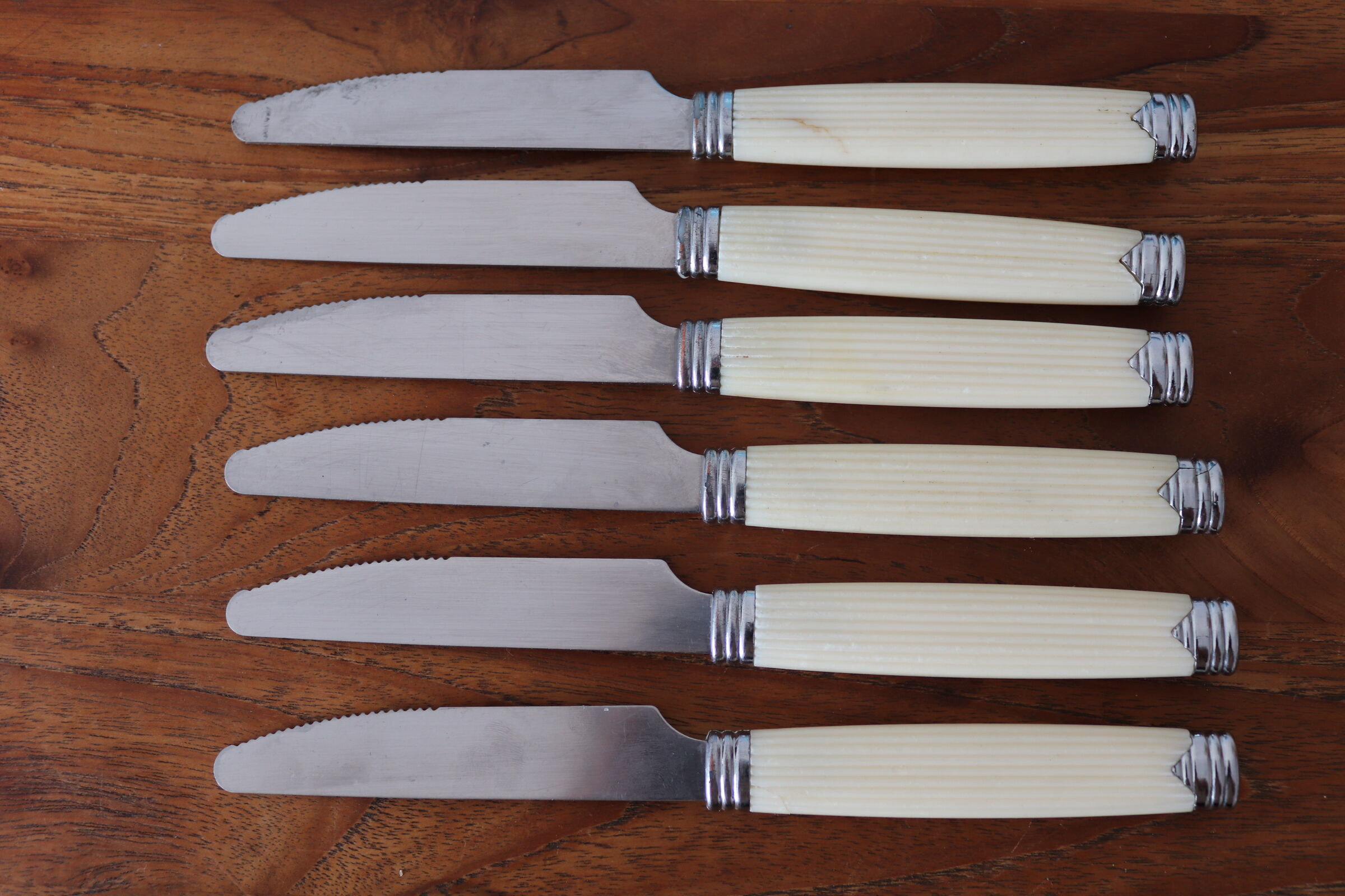 6 vintage cream white knives