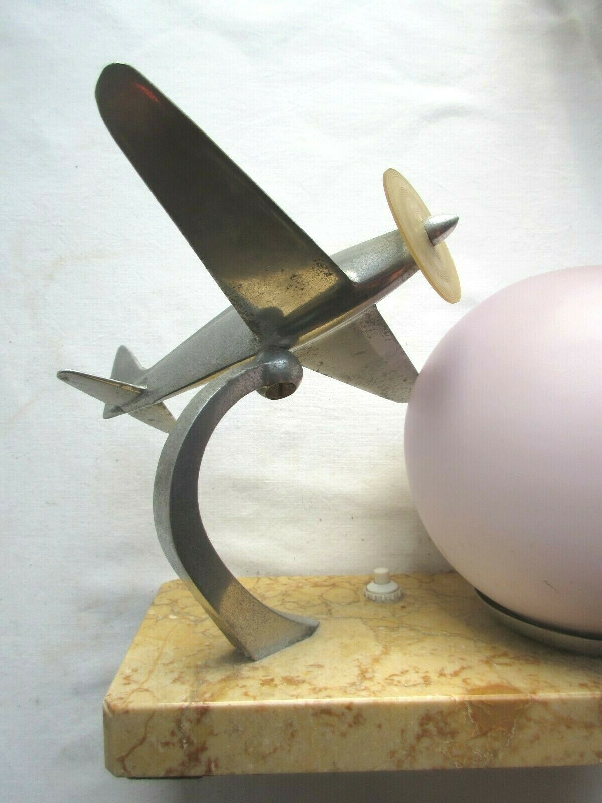 Art deco table lamp aluminum airplane and ball tulip on marble terrace