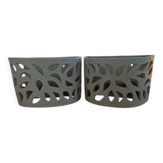 Wall sconces in raku. By Marie Kaikinger.