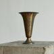 Art Deco fluted vase in patinated metal and brass from the 1930s.