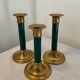 Trio of vintage bronze candle holders