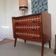 Teak and rattan chest of drawers feet compass