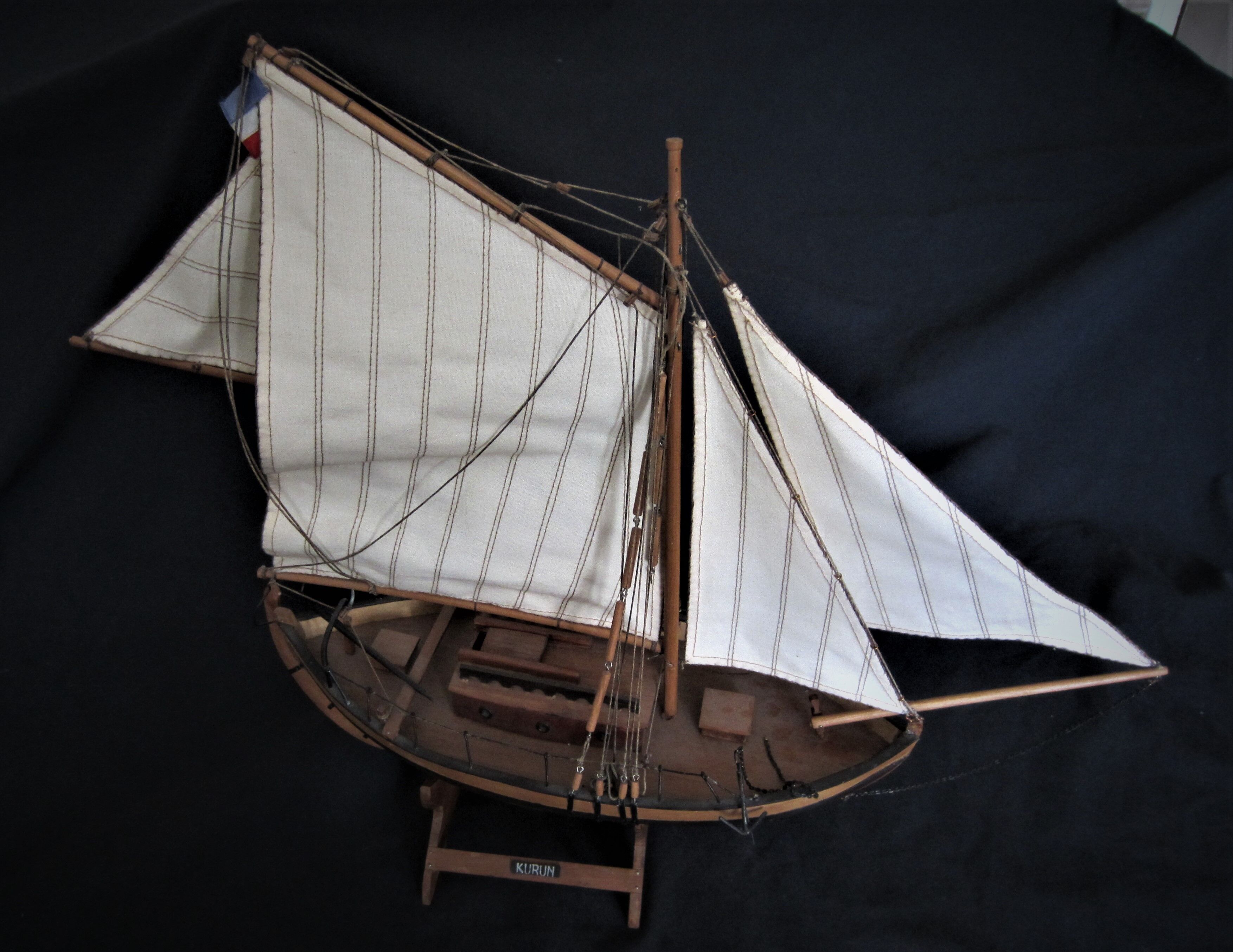 Wooden model of JY Toumelin's Kurun sailboat in Calais