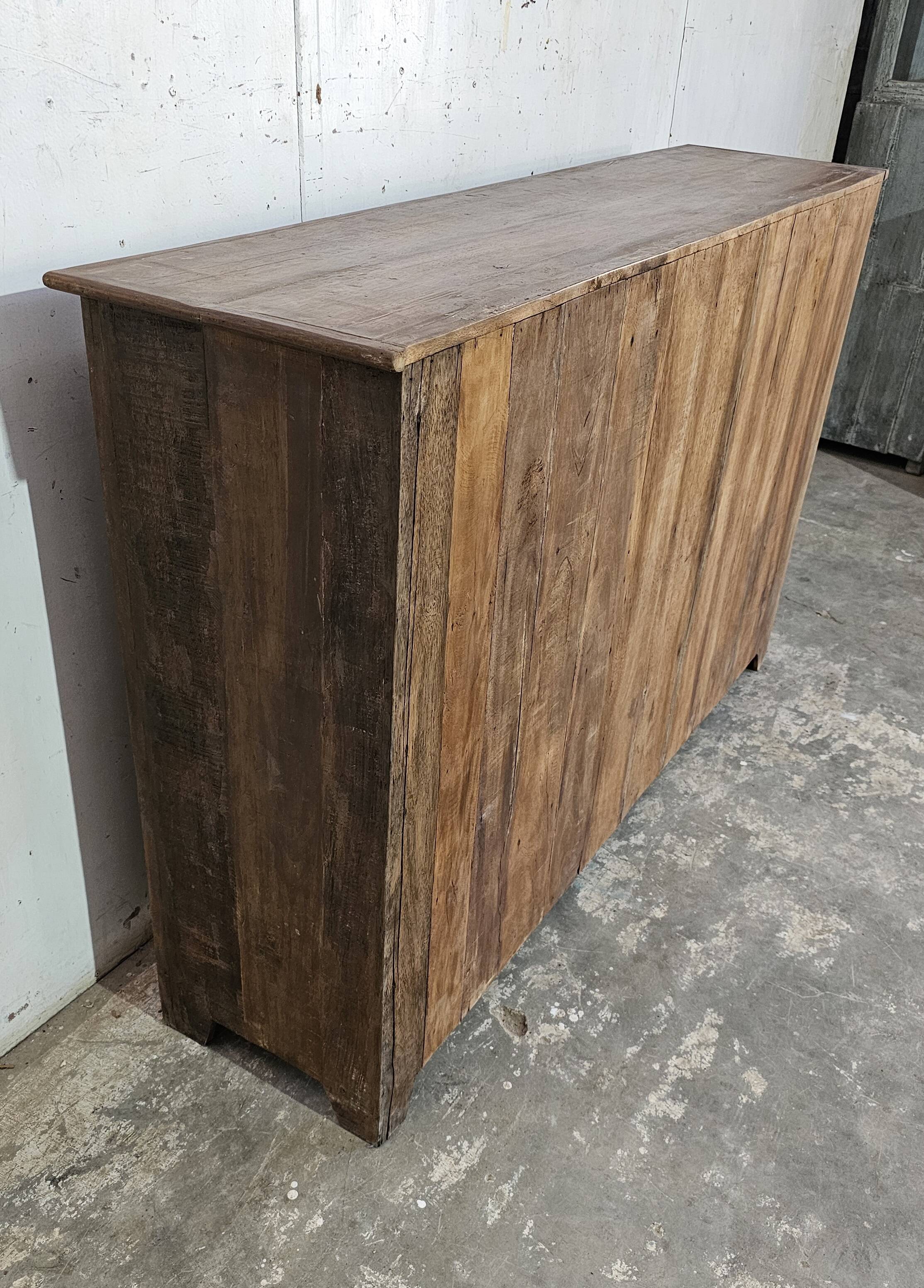 Antique glass-fronted buffet in Burmese teak
