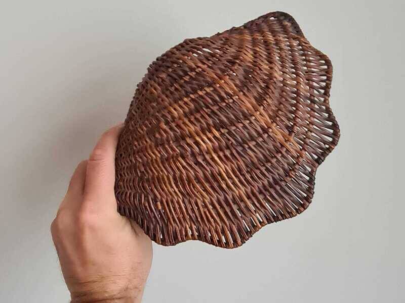 Vintage wicker shell basket, French bohemian decoration.