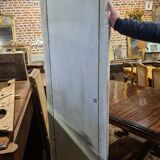 Miroir patiné beige avec des têtes de femme